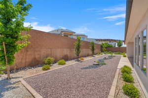 View of fenced backyard