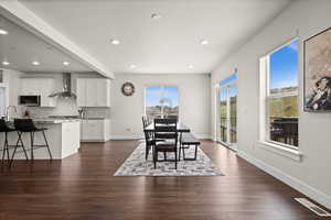 Dining room  with large windows with plenty of light
