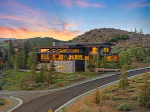 View of front of house featuring a chimney and a mountain view