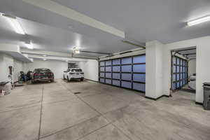 Garage featuring baseboards