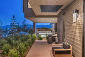 Porch featuring a mountain view