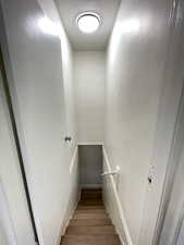 Staircase with wood finished floors