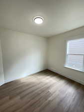 Empty room featuring light wood finished floors