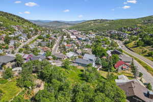 Aerial perspective of suburban area with mountains