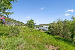 View of yard with a mountain view