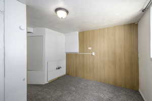 Empty room with carpet flooring