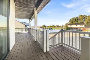 Wooden deck featuring a residential view