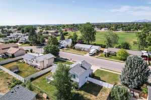 Aerial view of residential area with a mountainous background