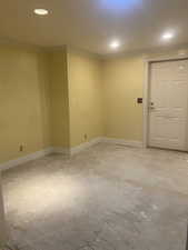 Newly sheet rocked workout/storage room.  Entrance from garage or from bsmt bar area.