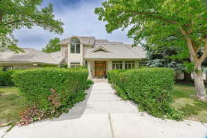 Traditional-style house with a tile roof