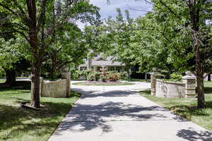 View of front facade featuring concrete driveway