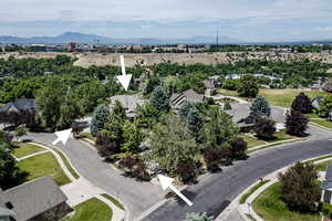 2 Driveways; frontage faces SW.  Backyard views to NE of USU on the other ridge.