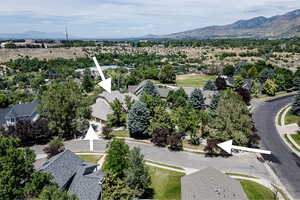 Home faces SW.  This view is looking NE at the University on the other ridge.