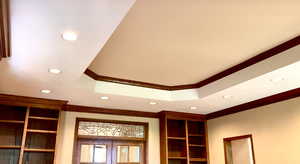 Detailed view of recessed lighting, french doors, and crown molding