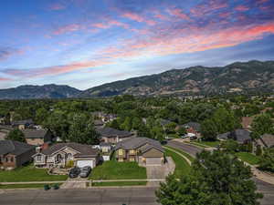 Mountain view featuring nearby suburban area