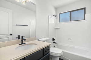 Full bathroom with vanity and shower / bath combination