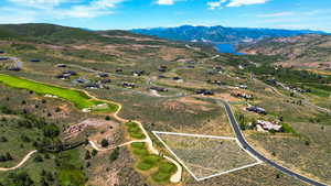 View of property location with a mountain backdrop and property parcel outlined