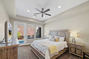 Bedroom with access to outside, carpet floors, recessed lighting, and ceiling fan