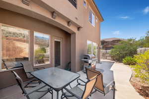 View of patio / terrace featuring area for grilling and outdoor dining space