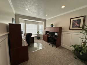Office featuring wainscoted wall
