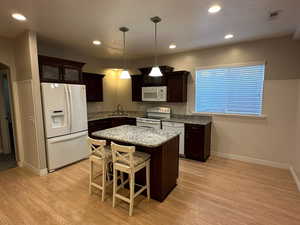 Full kitchen with granite countertops