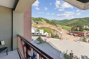 Balcony featuring a mountain view