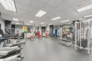 Exercise room with a paneled ceiling