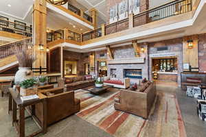 Common area with a high ceiling and recessed lighting