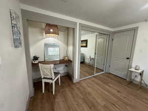 Bedroom featuring built in desk nook, closet, gorgeous views, natural light and ceiling fan