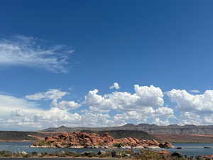 Mountain view featuring a large body of water