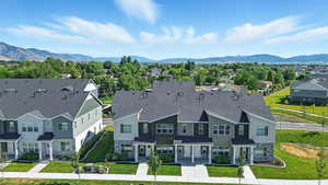Aerial view of residential area with a mountain backdrop
