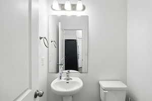 Bathroom with toilet and a sink