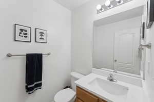 Bathroom with vanity and toilet