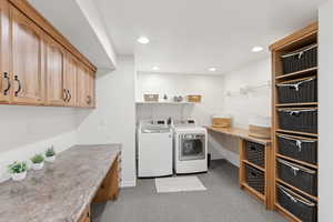 Laundry area featuring washer and clothes dryer, carpet floors, and recessed lighting