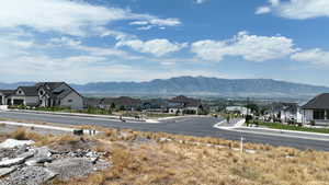 View of mountain backdrop with nearby suburban area