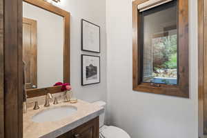Bathroom with vanity and toilet