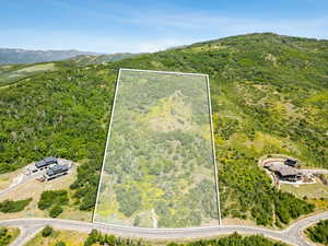 View of property location with property boundaries highlighted and mountains