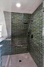 Bathroom with tiled shower