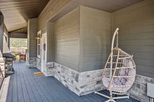 Wooden porch with grilling area