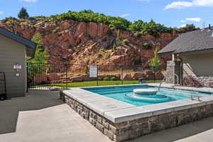 View of swimming pool featuring a patio and a swimming pool