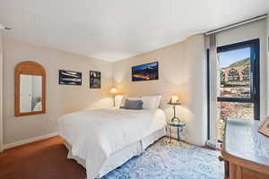 Bedroom with baseboards