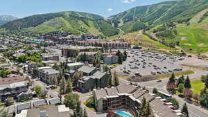 Aerial view of property's location with mountains