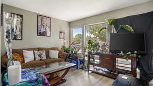 Living area with wood finished floors