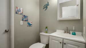 Bathroom with vanity and toilet