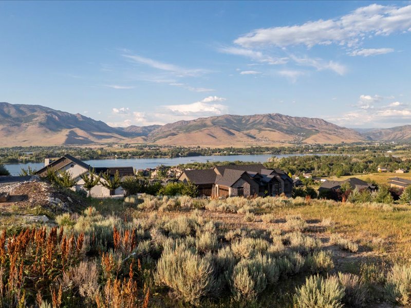 View of mountain backdrop with a nearby body of water