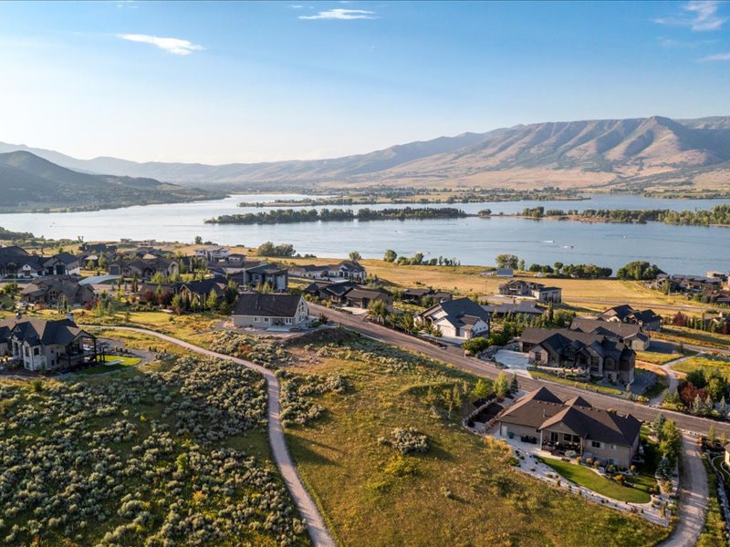 Aerial view of residential area with a water and mountain view