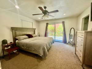 Bedroom with access to outside, light carpet, recessed lighting, a textured ceiling, and ceiling fan