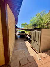 View of patio featuring a carport