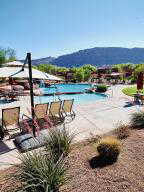 Community pool with a mountain view