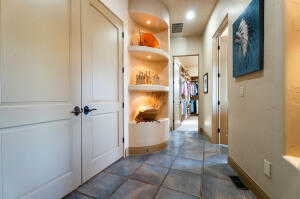Hallway featuring baseboards and recessed lighting